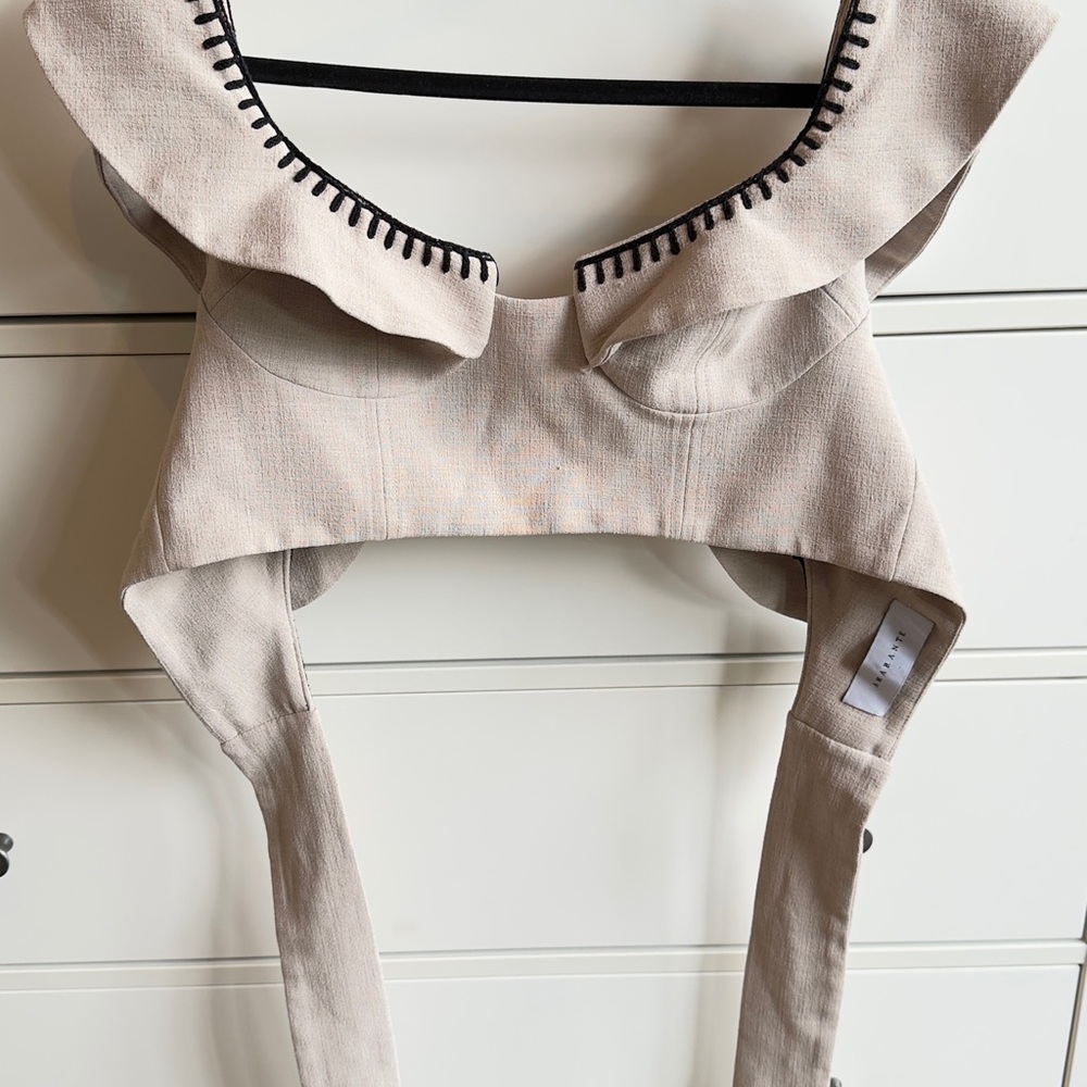Beige Ruffled Top with Black Trim